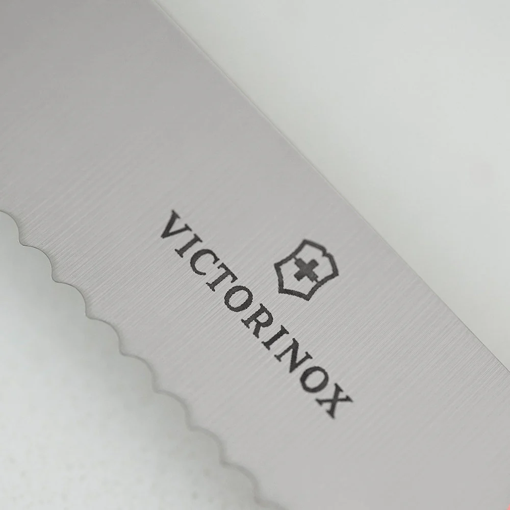 Victorinox Swiss Classic 4.5" Serrated Round Tip Paring Knife - Image 9